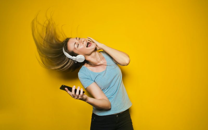 woman wearing white headphones