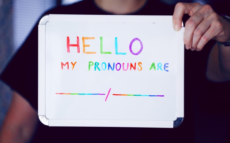 person holding white printer paper