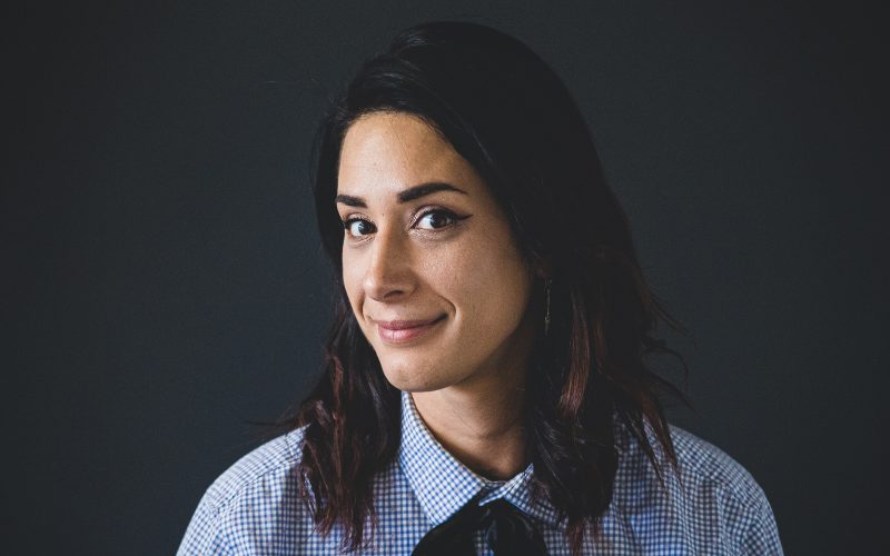 woman in white and blue checked dress shirt