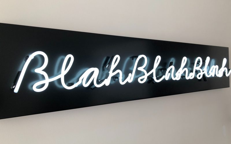 neon light mounted on white surface