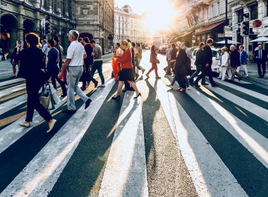 group of people walking on pedestrian lane