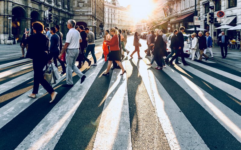 group of people walking on pedestrian lane