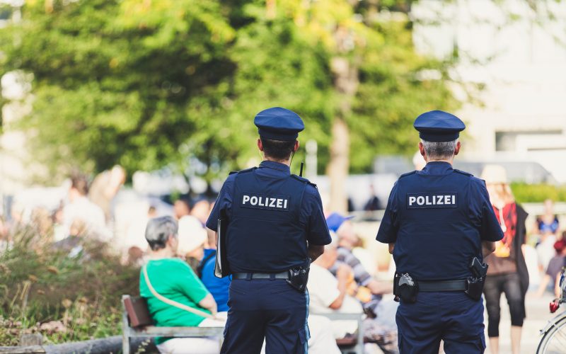 shallow focus photography of police