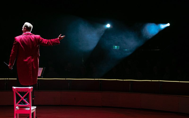 man in red coat